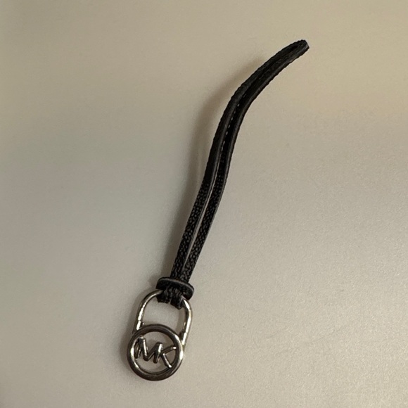 Michael Kors Handbags - Michael Kors Black Leather Bag Charm with Silver Logo